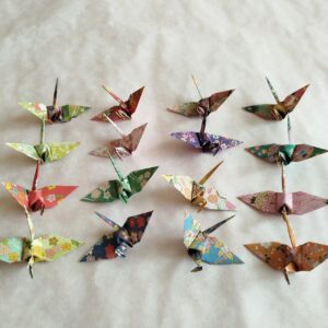 Japanese origami crane made from traditional chiyogami paper small handmade wedding decoration