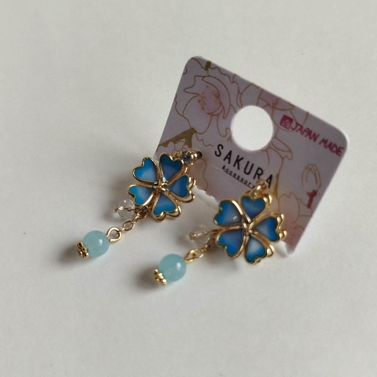 Sakura Stud Earrings – Light Blue Enamel & Delicate Chain - Image 2
