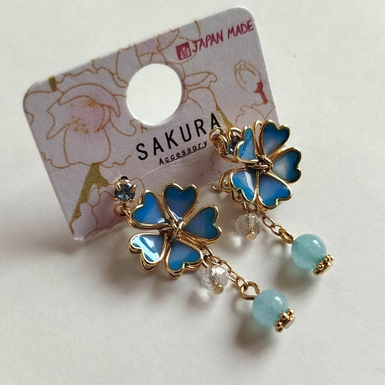 Sakura Stud Earrings – Light Blue Enamel & Delicate Chain - Image 4